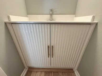 a bathroom with a sink and a tub