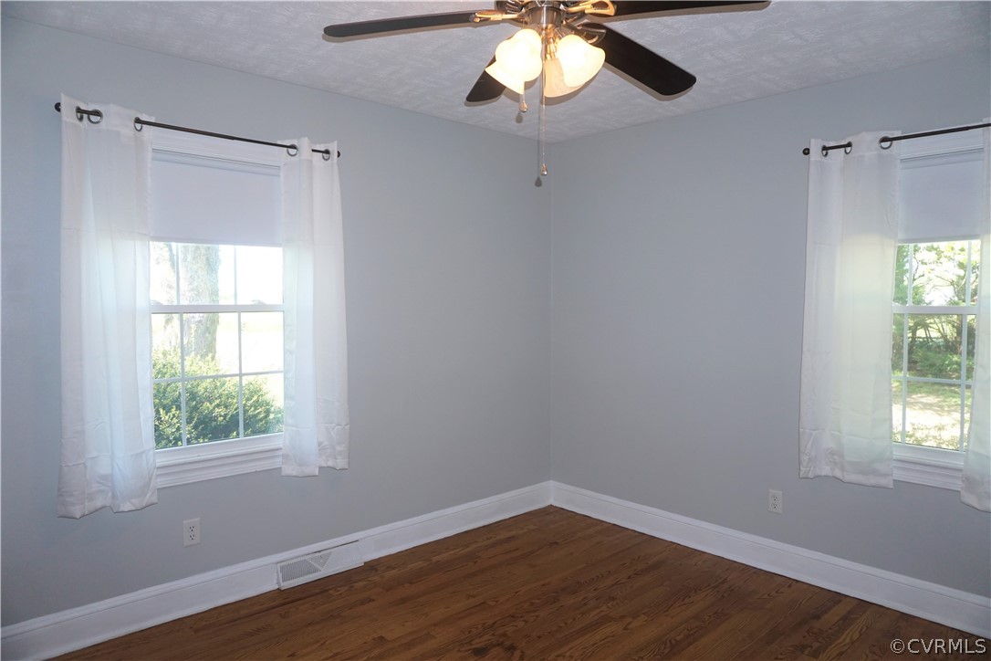 17322 Old Ridge Road Montpelier, VA 23192 - Photo 14 of 50 a view of an empty room with wooden floor and a window