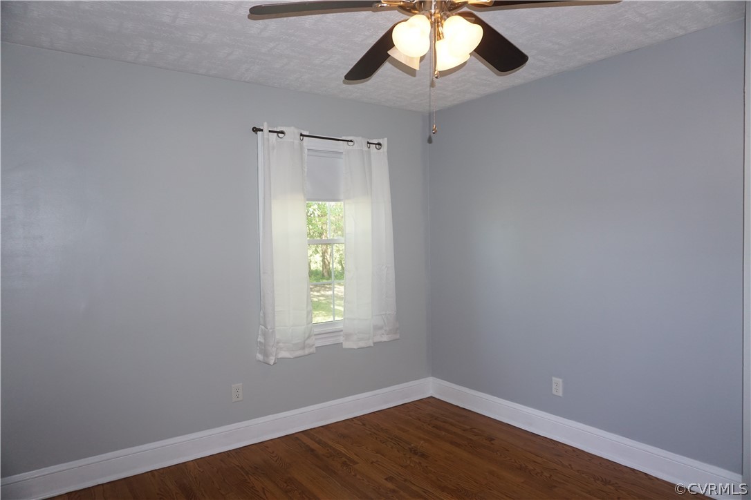 17322 Old Ridge Road Montpelier, VA 23192 - Photo 15 of 50 an empty room with a window and a chandelier fan