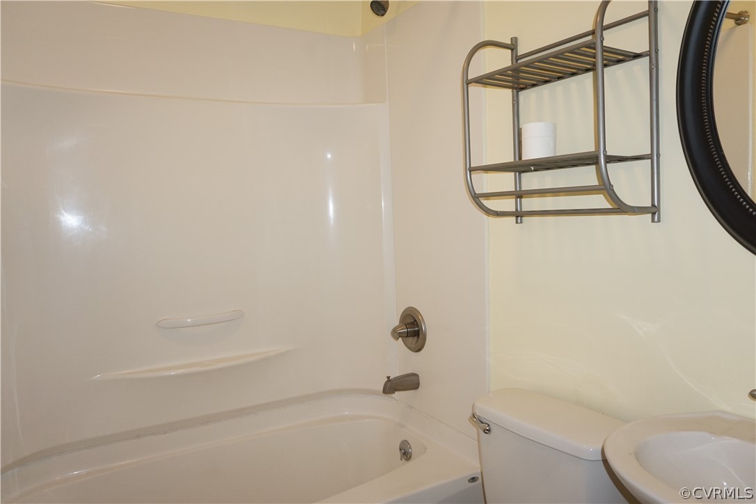 17322 Old Ridge Road Montpelier, VA 23192 - Photo 16 of 50 a bathroom with a shower a toilet and a shower
