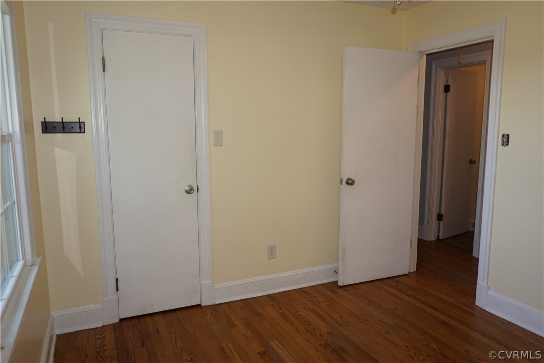 17322 Old Ridge Road Montpelier, VA 23192 - Photo 18 of 50 a view of an empty room with wooden floor and a hallway