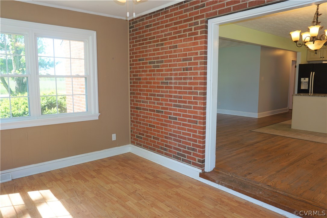 17322 Old Ridge Road Montpelier, VA 23192 - Photo 21 of 50 a view of an empty room with wooden floor and a window