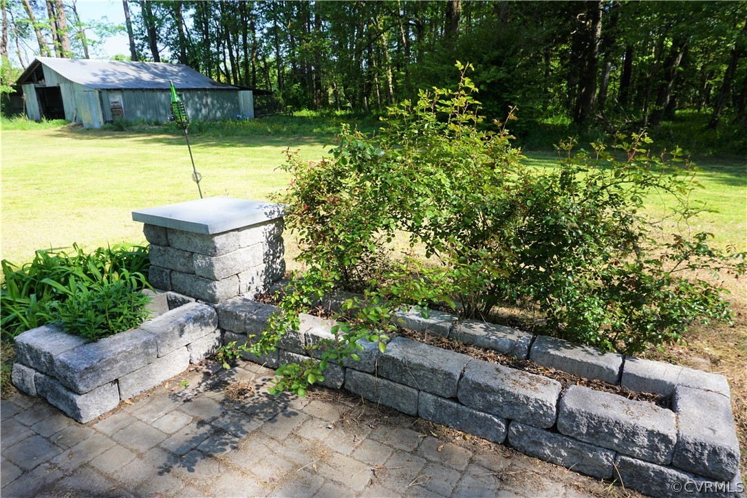 17322 Old Ridge Road Montpelier, VA 23192 - Photo 26 of 50 a view of a swimming pool with a patio