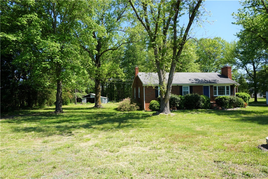 17322 Old Ridge Road Montpelier, VA 23192 - Photo 48 of 50 a front view of a house with a yard