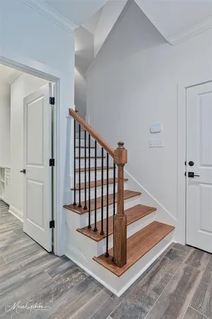 a view of a hallway with staircase