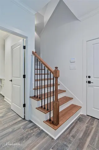 a view of a hallway with staircase