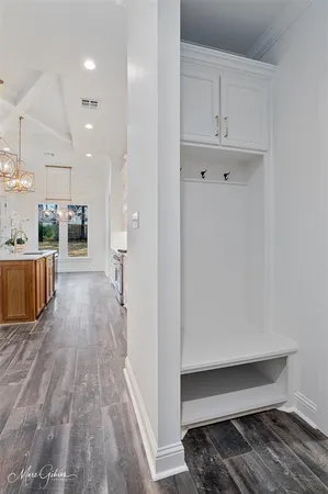 a view of a living room with wooden floor