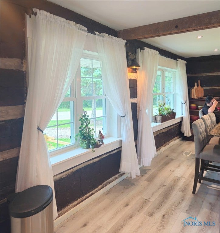30702 Weichman Road Holgate, OH 43527 - Photo 23 of 50 Exposed logs hug the big kitchen windows~