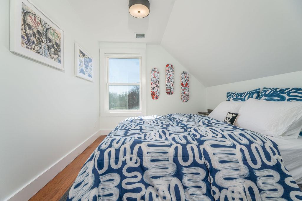 1030 Horseshoe Drive Cutchogue, NY 11935 - Photo 13 of 19 a bedroom with a bed and a window