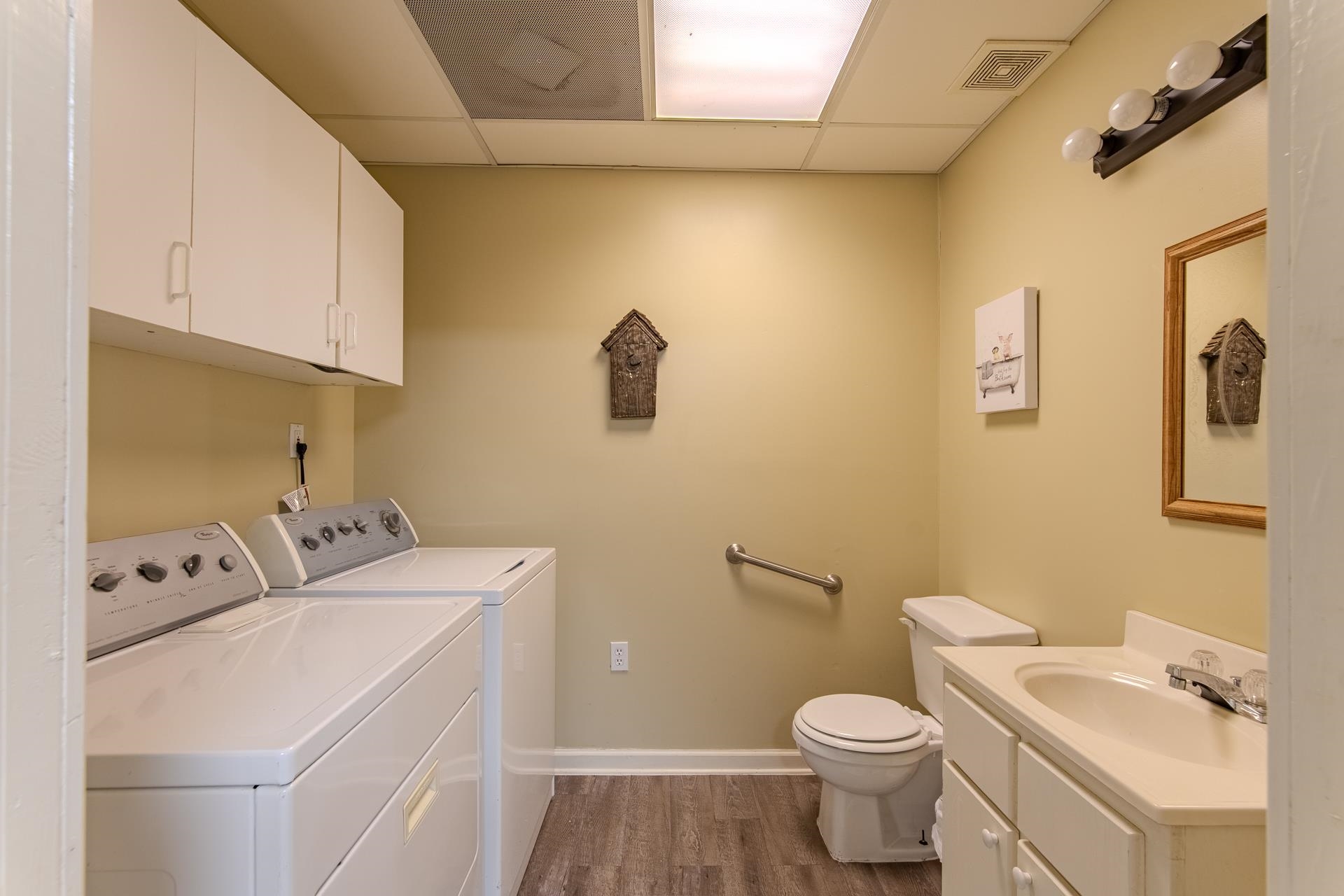2125 Bruton Branch Road Savannah, TN 38372 - Photo 23 of 33 a bathroom with a sink a toilet and a mirror