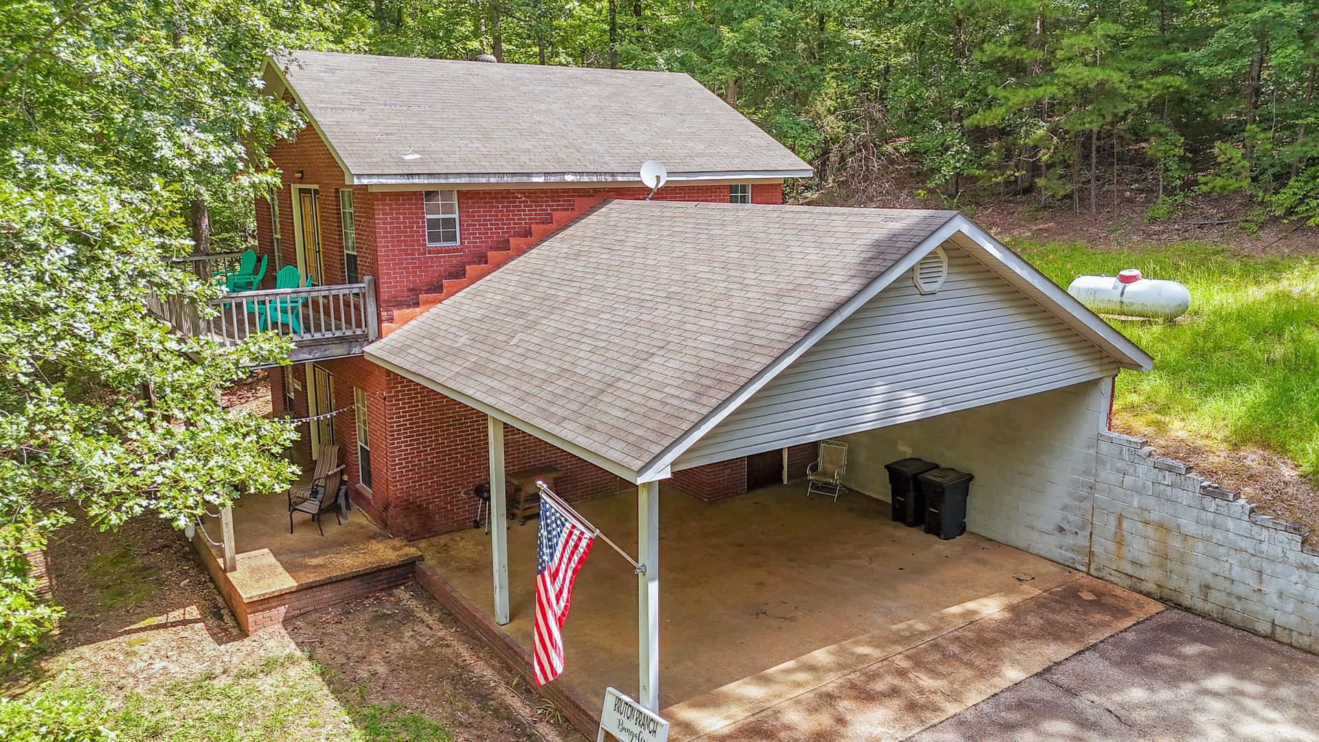 2125 Bruton Branch Road Savannah, TN 38372 - Photo 27 of 33 a view of house with backyard and trees