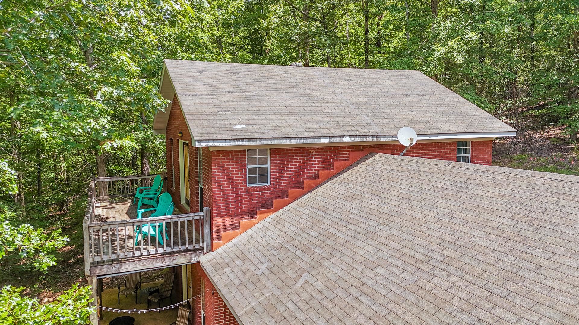 2125 Bruton Branch Road Savannah, TN 38372 - Photo 28 of 33 a terrace of a house with wooden floor and fence