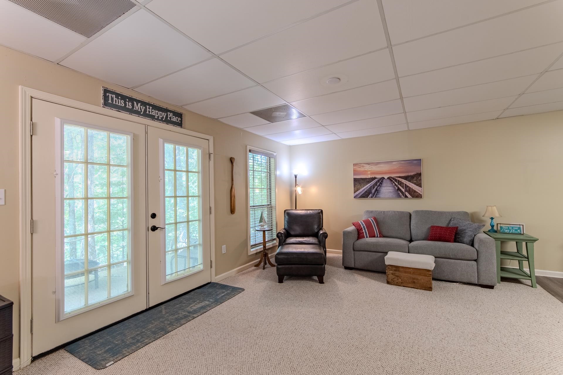 2125 Bruton Branch Road Savannah, TN 38372 - Photo 8 of 33 a living room with furniture and a flat screen tv