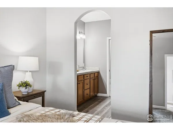 a large white bed in a white room