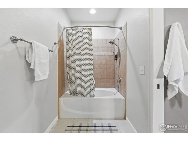 a bathroom with a granite countertop sink mirror and a