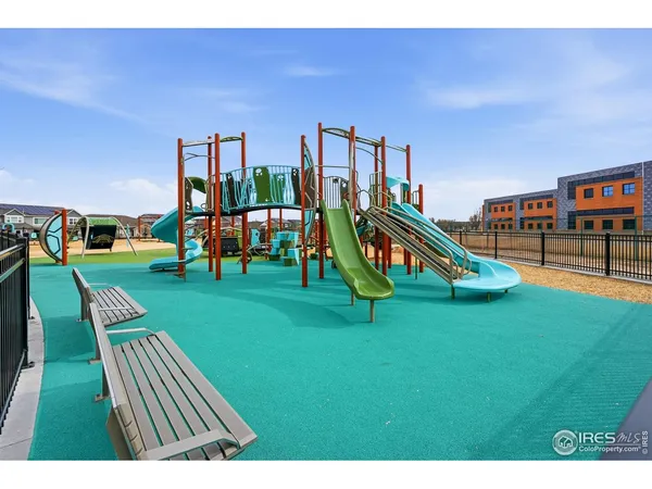 a view of a park with swings