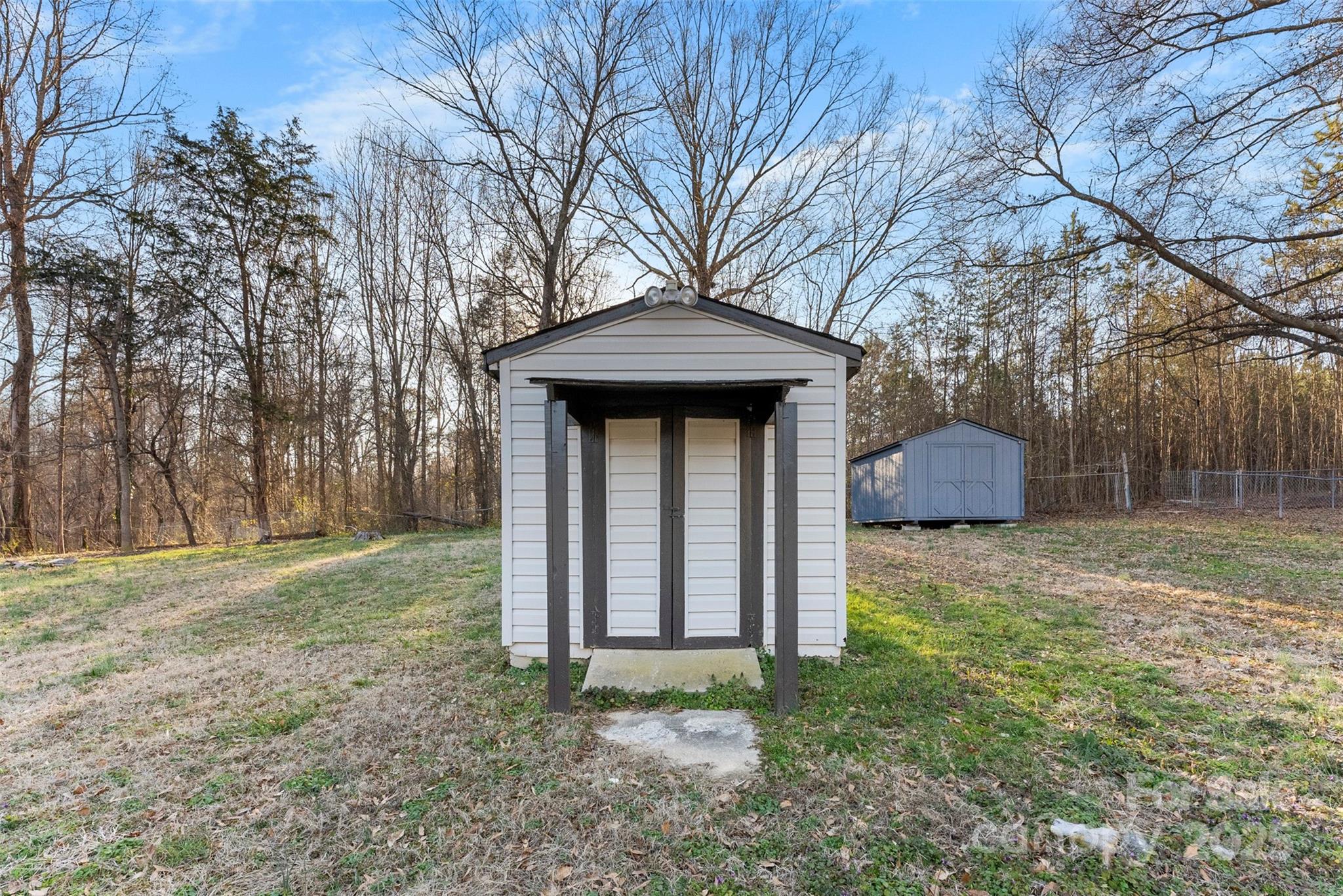 2729 Springbrook Circle Gastonia, NC 28052 - Photo 31 of 37 a front view of a house with garden