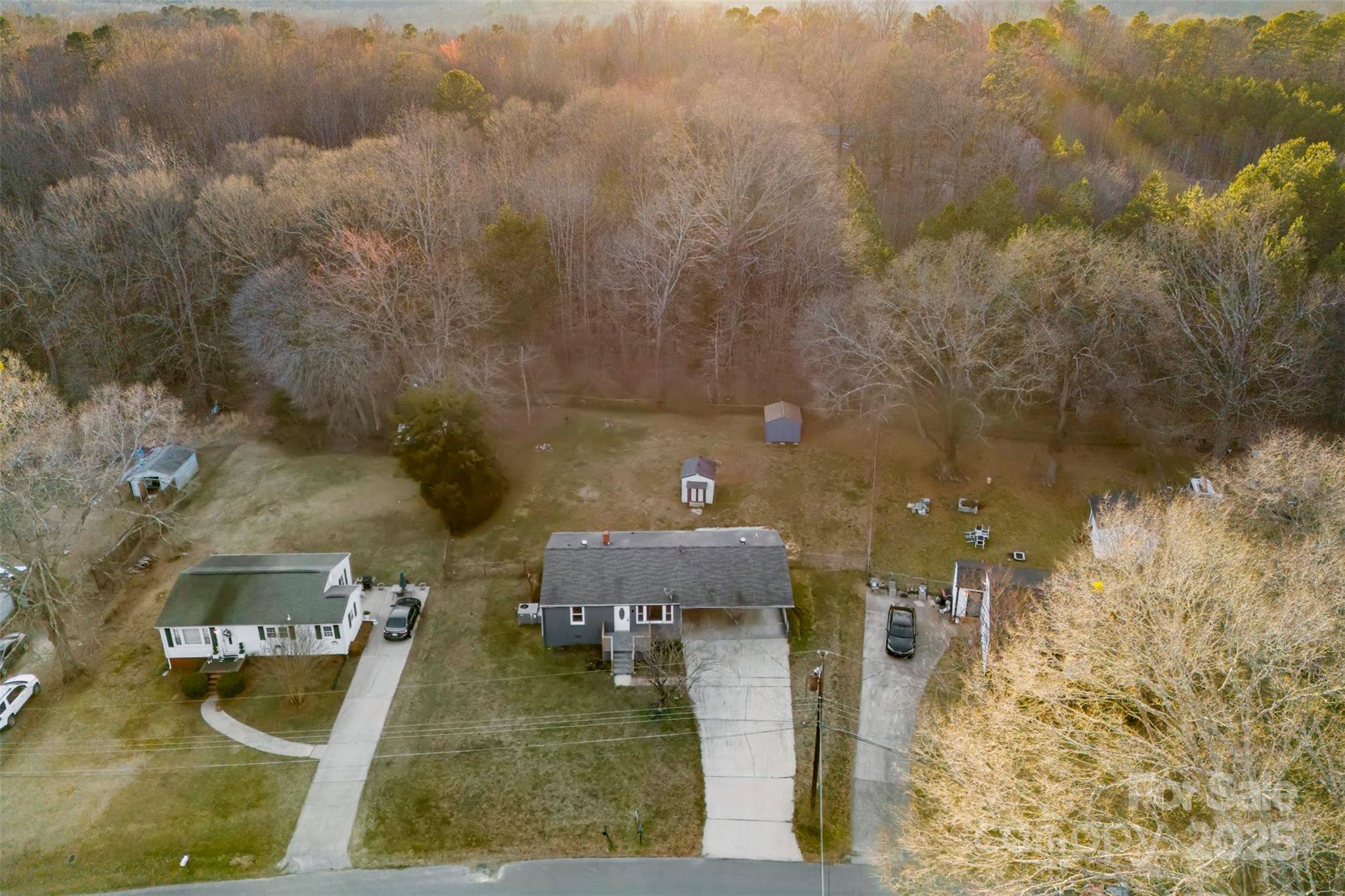 2729 Springbrook Circle Gastonia, NC 28052 - Photo 35 of 37 an aerial view of a house with a yard and large tree