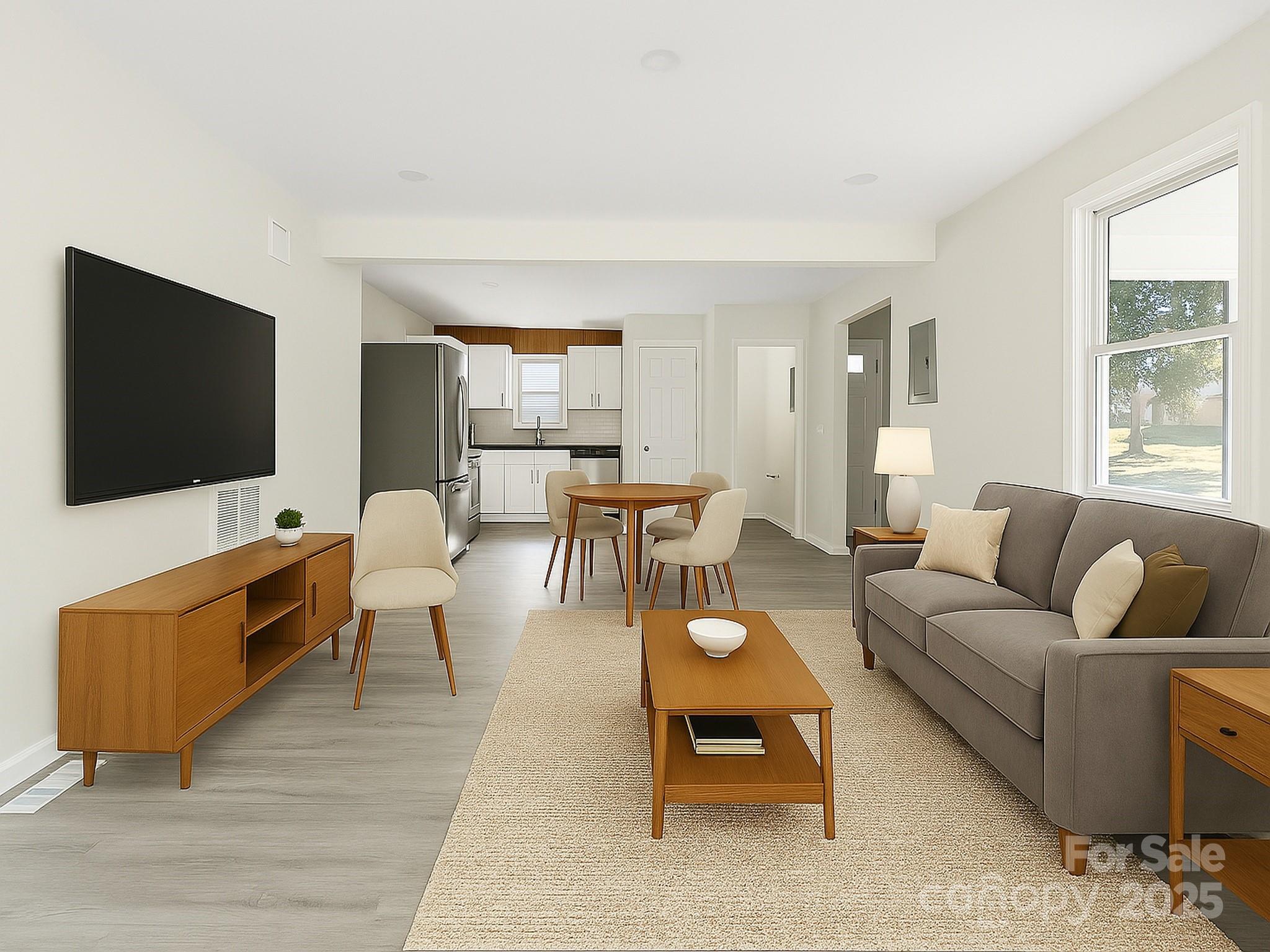 2729 Springbrook Circle Gastonia, NC 28052 - Photo 9 of 37 a living room with furniture and a flat screen tv