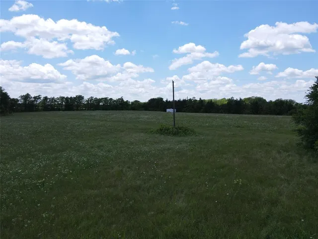 a view of a golf course with a lake