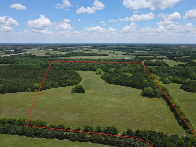 a view of a lake with a house