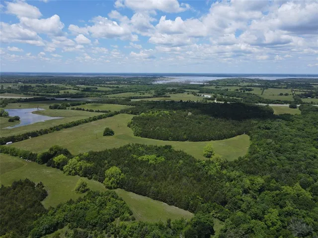 a view of a lake with a city