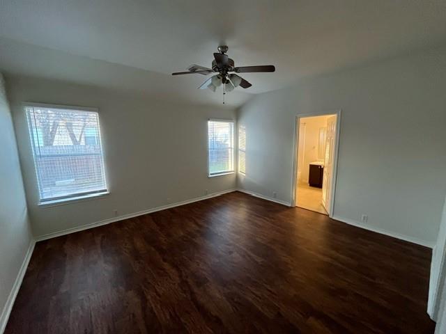 908 Rocking Spur Cove Pflugerville, TX 78660 - Photo 7 of 28 wooden floor in an empty room with a window