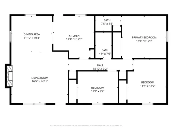 a view of backyard with cabin and wooden fence