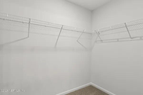 a view of a room with racks on the wall