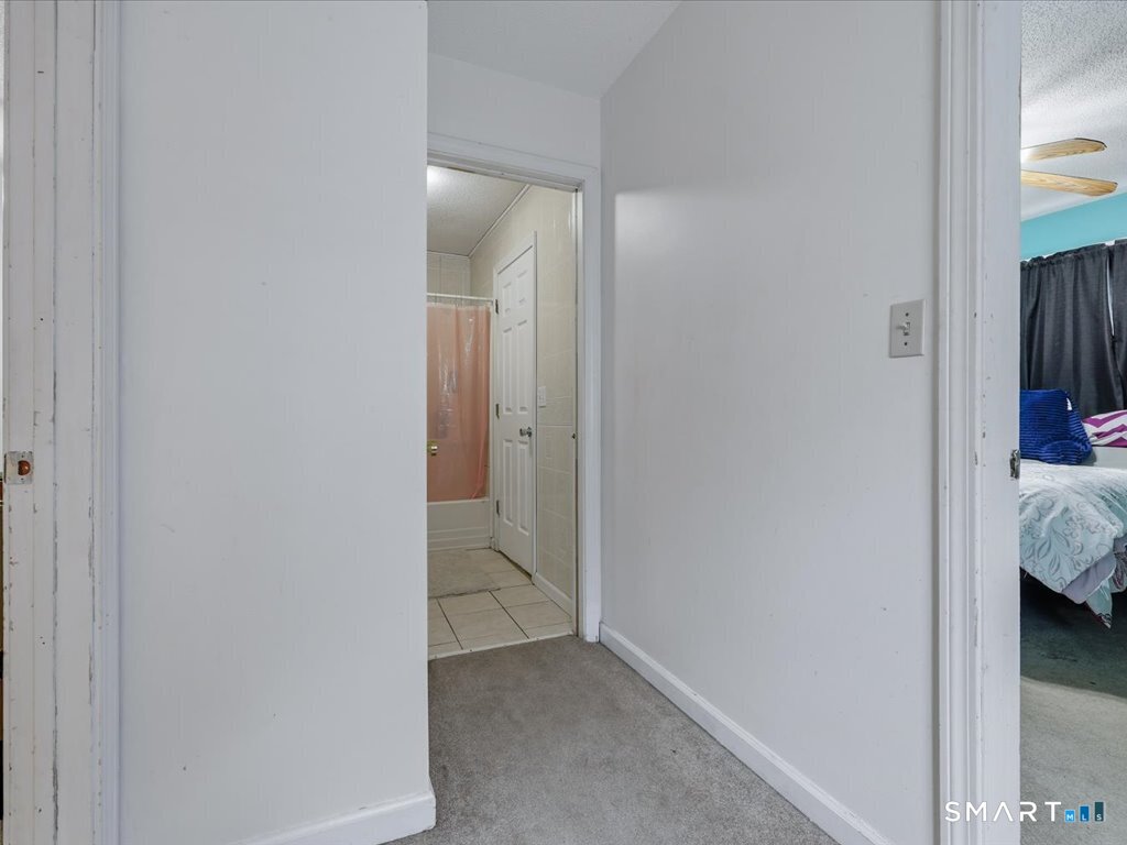 78 Woodland Ridge Meriden, CT 06450 - Photo 15 of 24 a view of bedroom and bathroom