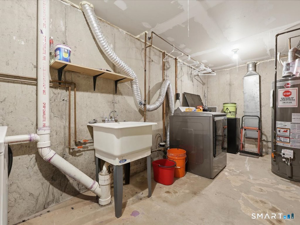 78 Woodland Ridge Meriden, CT 06450 - Photo 22 of 24 a view of living room with furniture and a chandelier