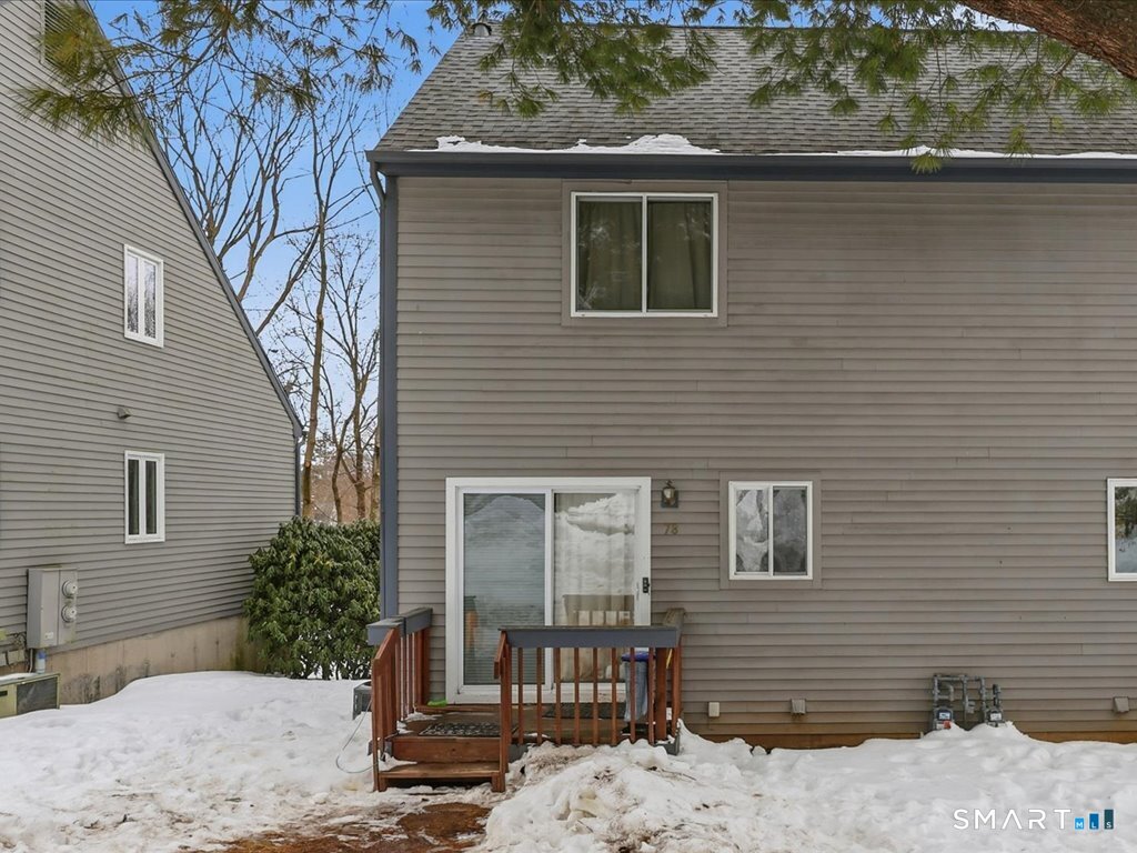 78 Woodland Ridge Meriden, CT 06450 - Photo 23 of 24 a view of a house with a yard