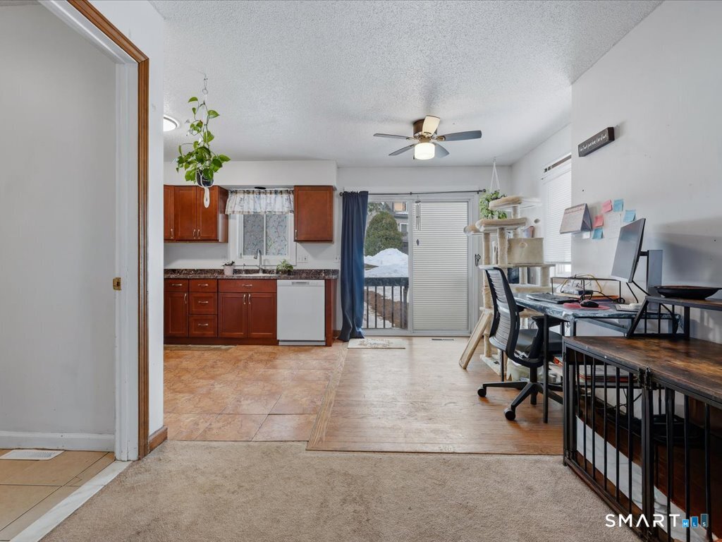 78 Woodland Ridge Meriden, CT 06450 - Photo 4 of 24 a view of kitchen with cabinets and window