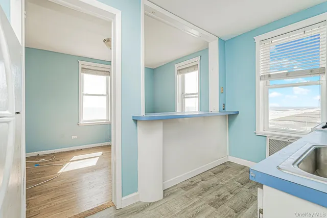 a view of a sink and a window