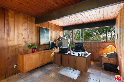 a view of balcony with wooden floor and outdoor space