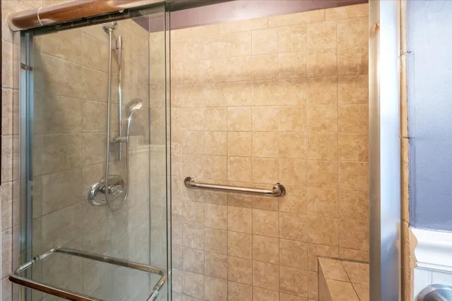 a view of a room that has a window in it