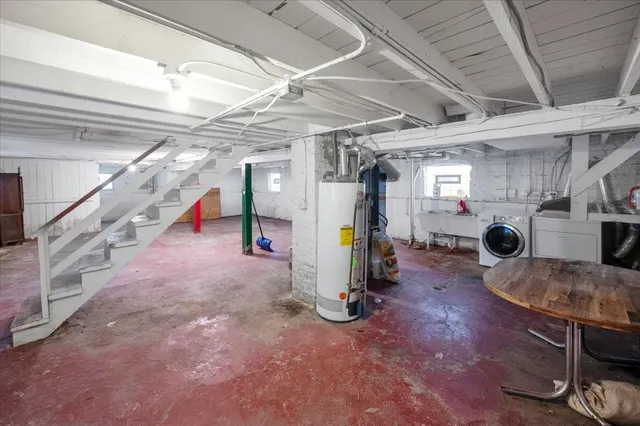 a view of a hallway with stairs