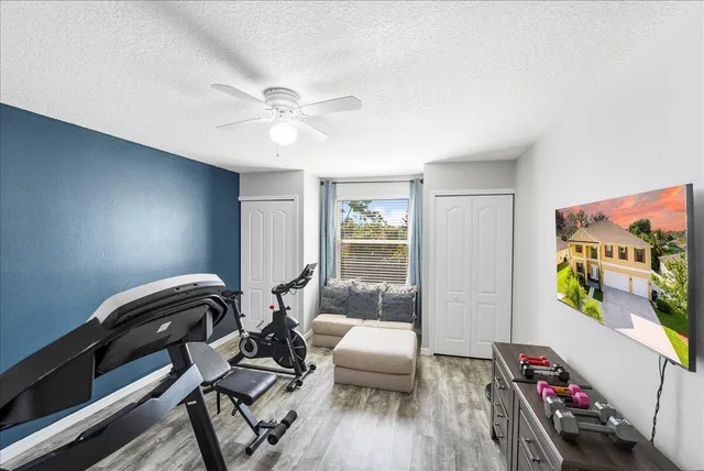 a bathroom with a sink mirror toilet and shower