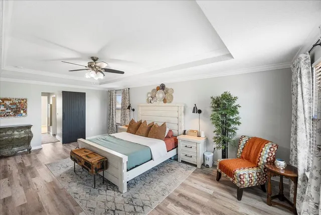 a bathroom with a bathtub sink and mirror