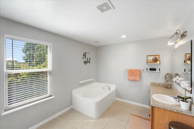 a sitting area with furniture and garden view