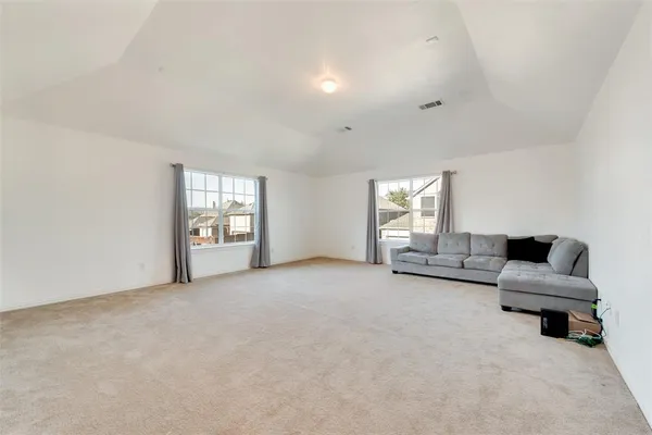 a view of livingroom with furniture and white walls