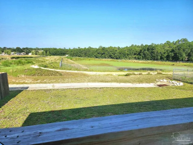 a view of an ocean and a mountain