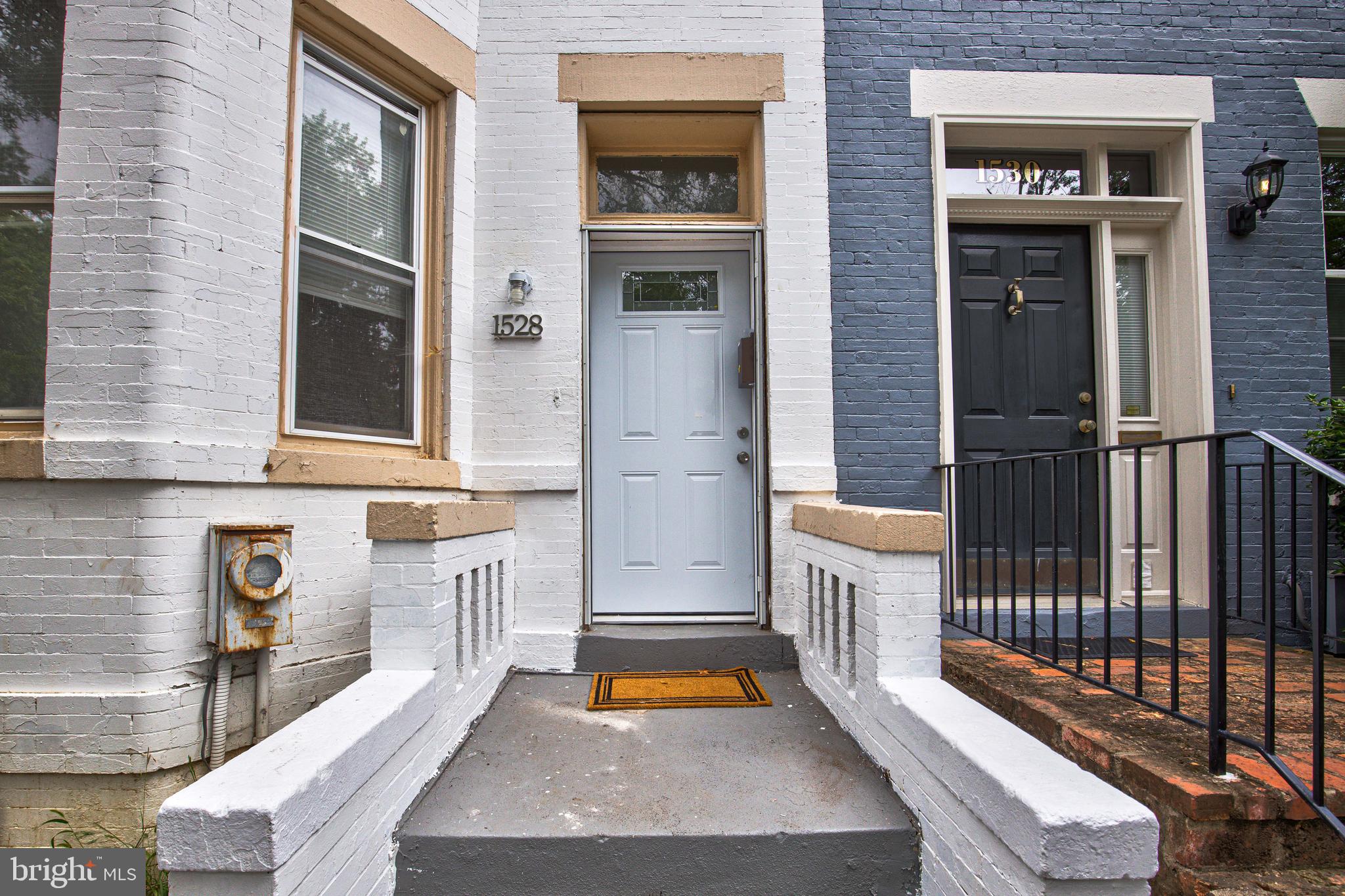 1528 E Street Southeast Washington, DC 20003 - Photo 3 of 30 a front view of a house with glass door