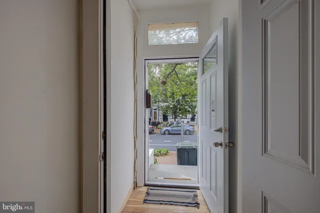 a view of a livingroom from a hallway