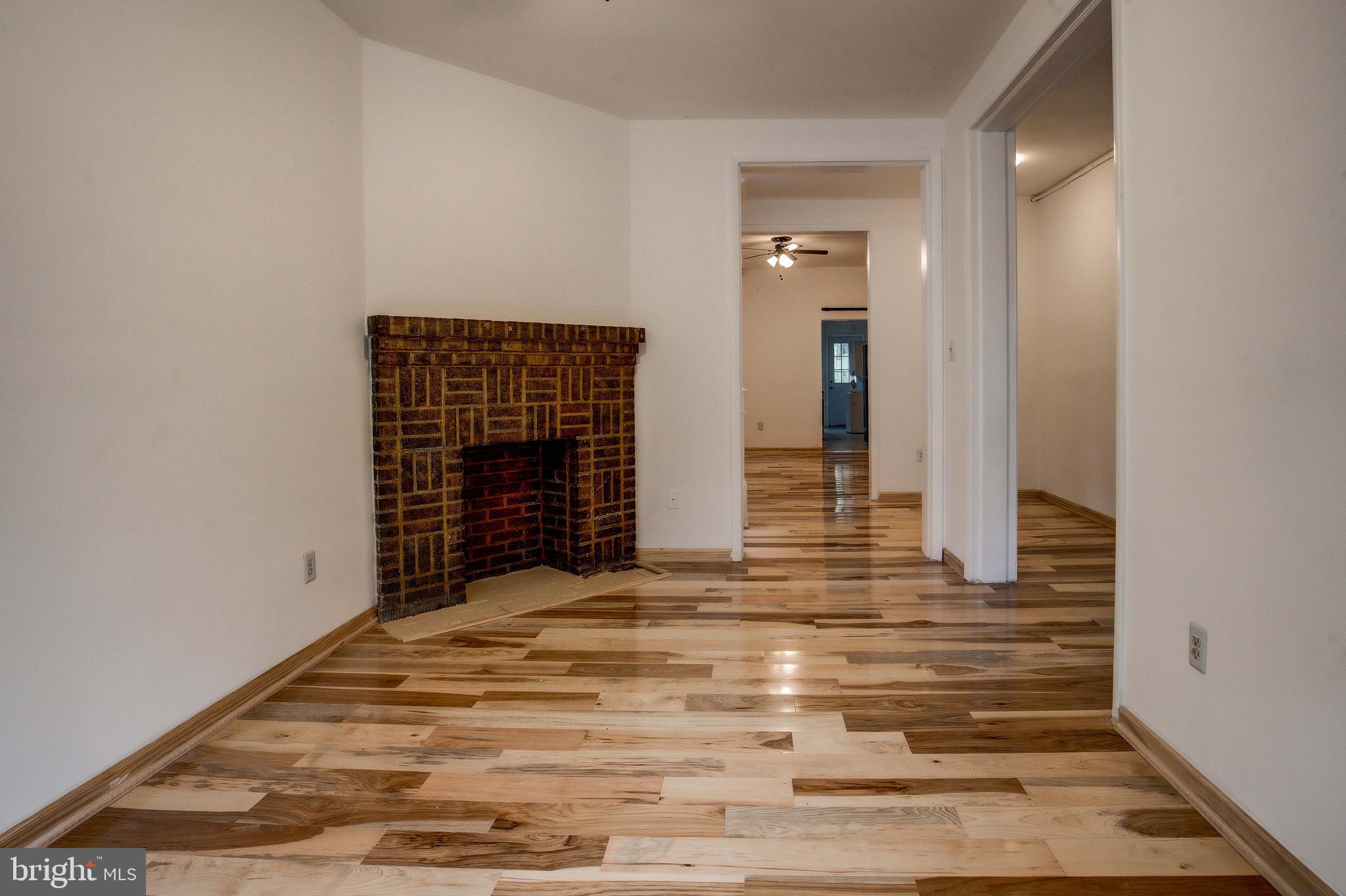 1528 E Street Southeast Washington, DC 20003 - Photo 8 of 30 a view of empty room with wooden floor