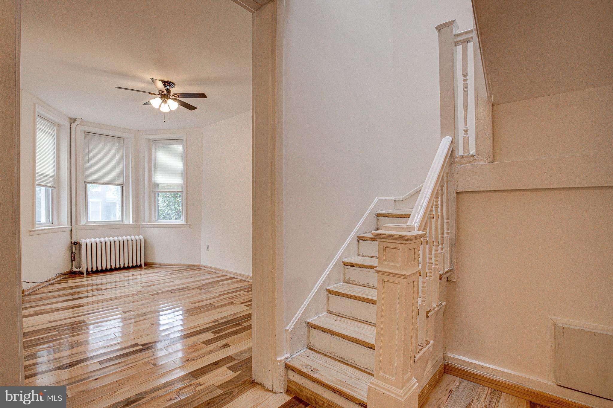 1528 E Street Southeast Washington, DC 20003 - Photo 10 of 30 a view of an entryway with wooden floor and workspace