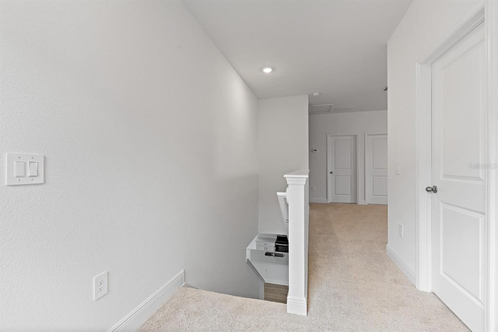 2276 Hen Road Minneola, FL 34715 - Photo 18 of 40 a view of kitchen and utility room