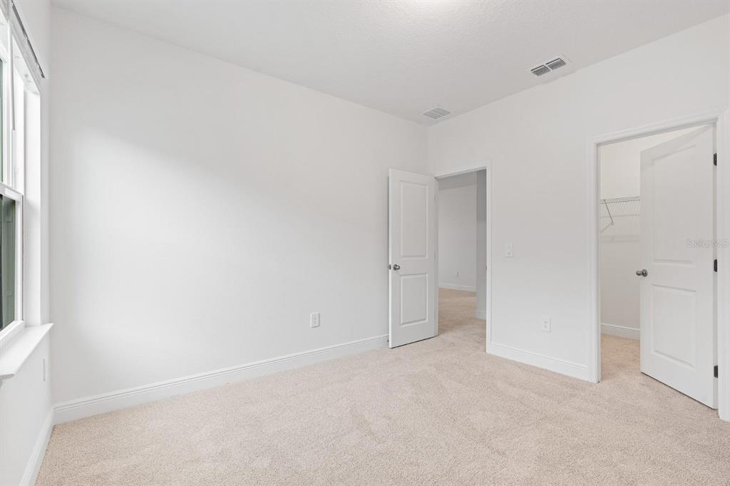 2276 Hen Road Minneola, FL 34715 - Photo 23 of 40 a view of an empty room