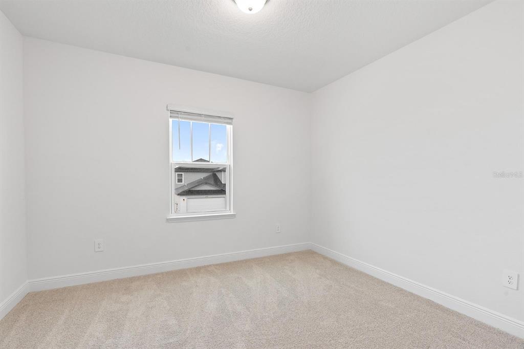 2276 Hen Road Minneola, FL 34715 - Photo 26 of 40 a view of a window in a room