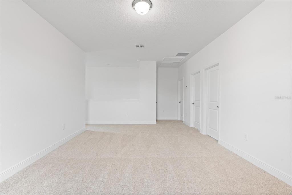 2276 Hen Road Minneola, FL 34715 - Photo 28 of 40 a view of an empty room